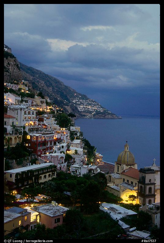 Positano lights coming up at dusk. Amalfi Coast, Campania, Italy