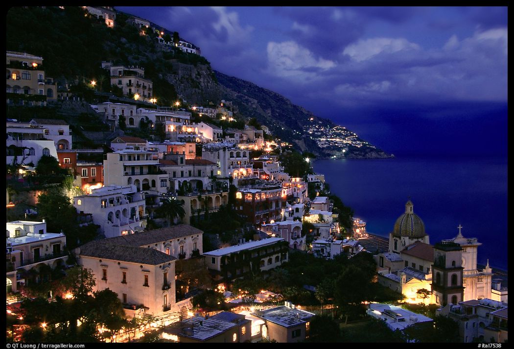 Positano lights coming up after sunset. Amalfi Coast, Campania, Italy