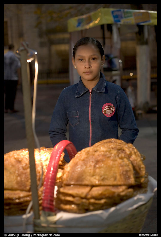 Young street food vendor by night. Guadalajara, Jalisco, Mexico