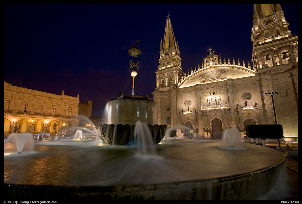 Plazza de los Laureles, fountain, and Cathedral by night. Guadalajara, Jalisco, Mexico
