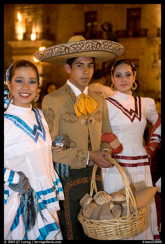 Man with sombrero hat surrounded by  two women. Guadalajara, Jalisco, Mexico