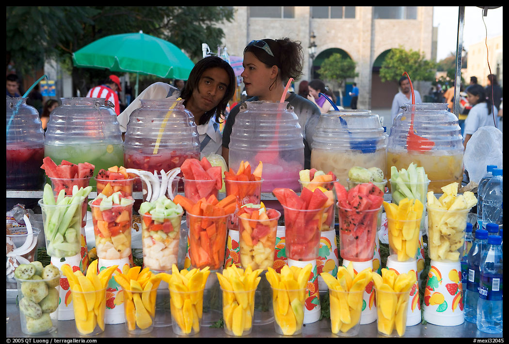 Cups of fresh fruits offered for sale on the street. Guadalajara, Jalisco, Mexico