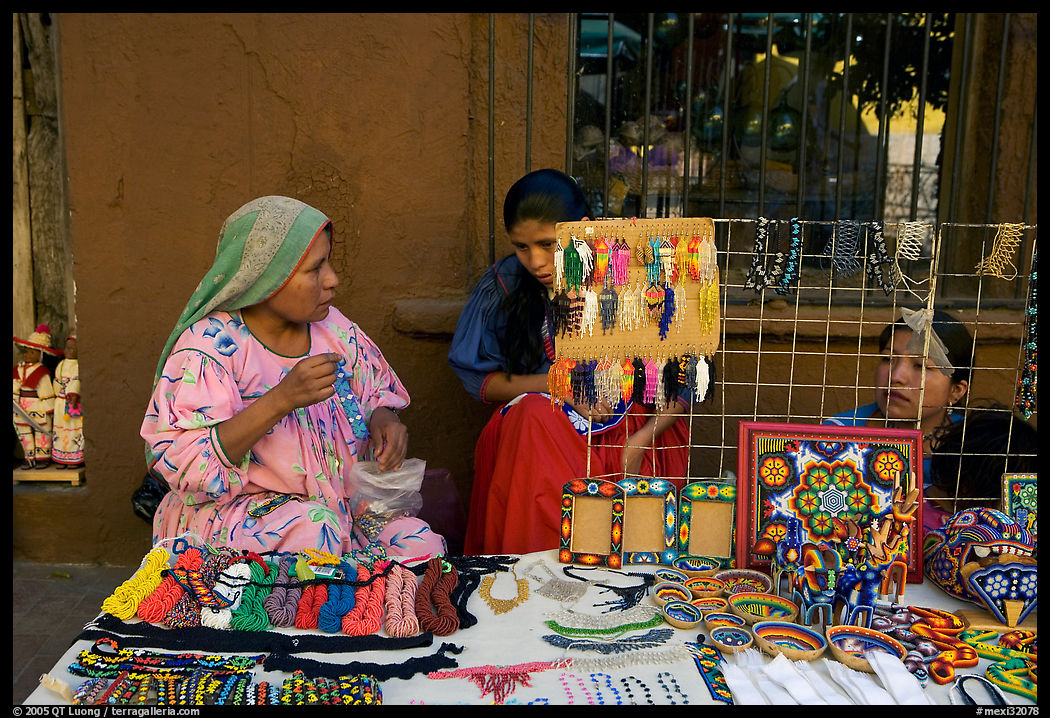 Huichol women selling crafts on the street, Tlaquepaque. Jalisco, Mexico