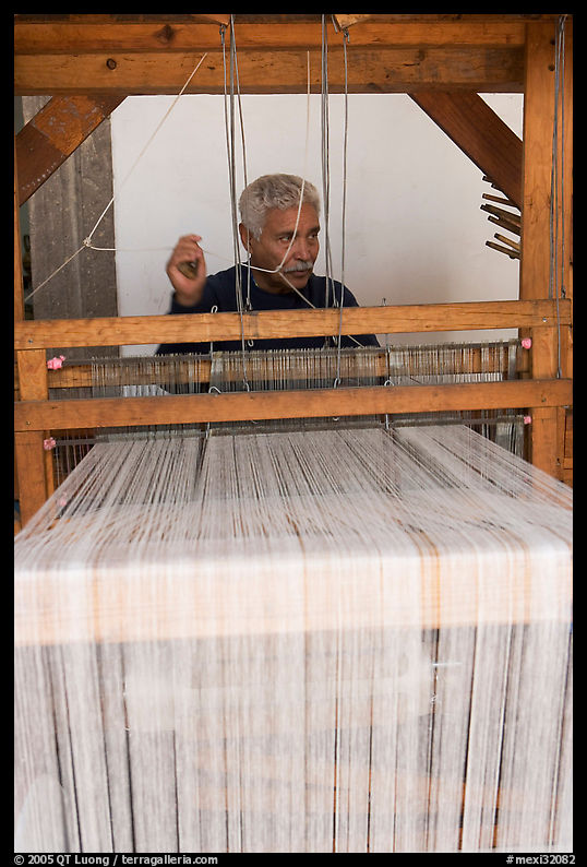 Man operating a weaving machine, Tlaquepaque. Jalisco, Mexico