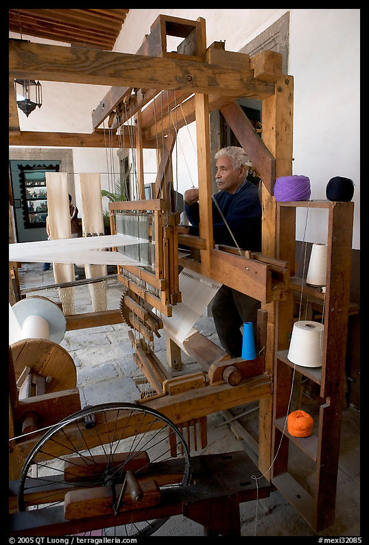 Traditional weaver and machine seen from the side, Tlaquepaque. Jalisco, Mexico