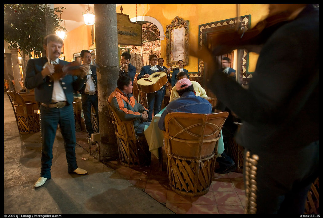 Mariachi musicians performing a serenade at the Parian, Tlaquepaque. Jalisco, Mexico