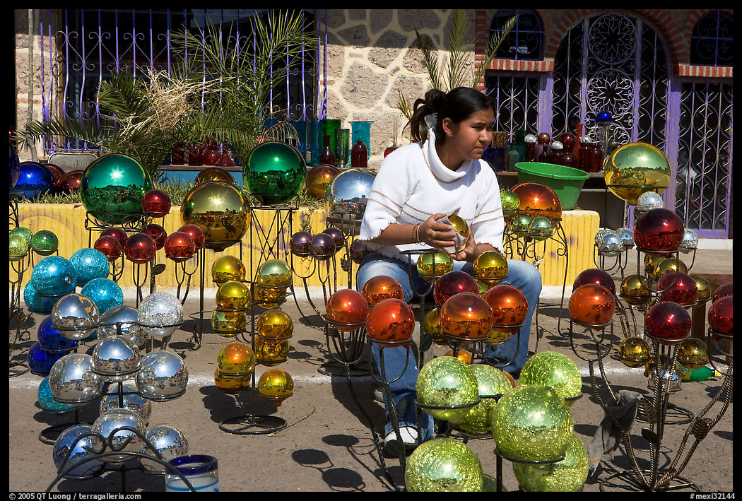 Woman polishing glass spheres, Tonala. Jalisco, Mexico