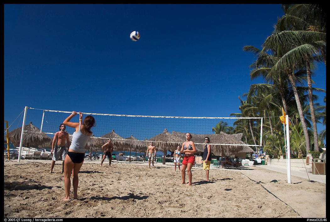 Vacationers playing beach volley-ball, Nuevo Vallarta, Nayarit. Jalisco, Mexico