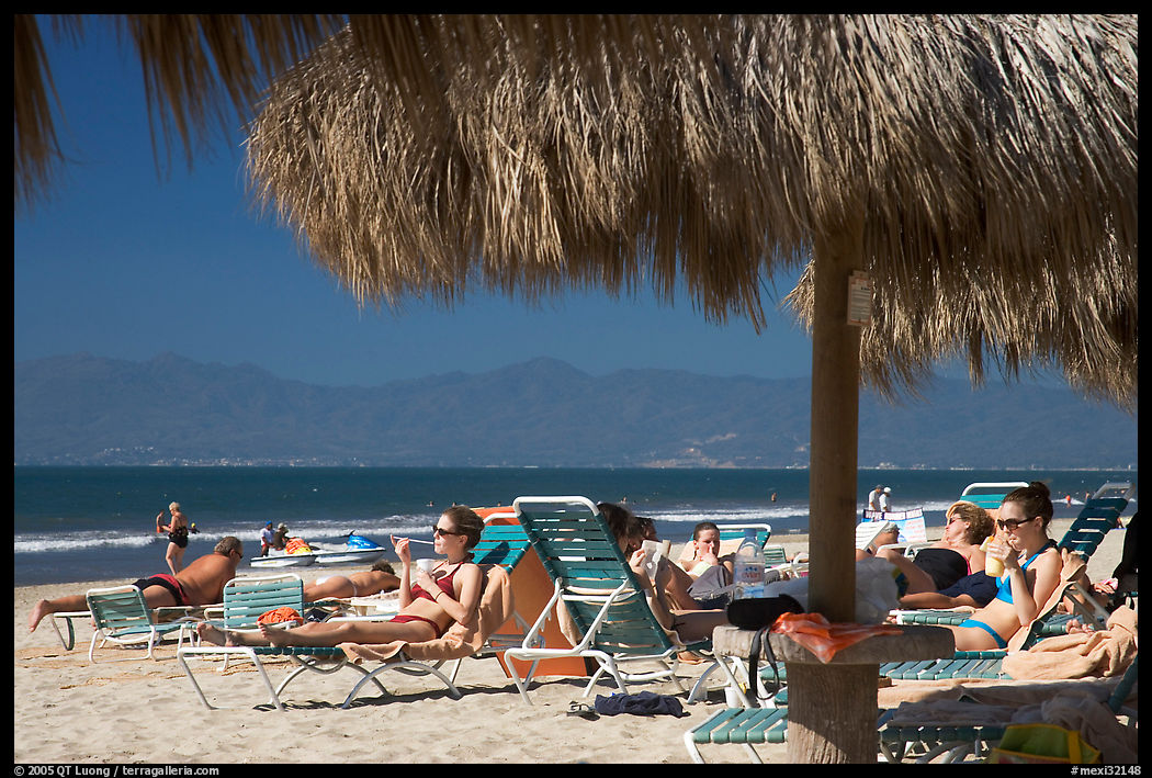 People lying on beach chairs, Nuevo Vallarta, Nayarit. Jalisco, Mexico