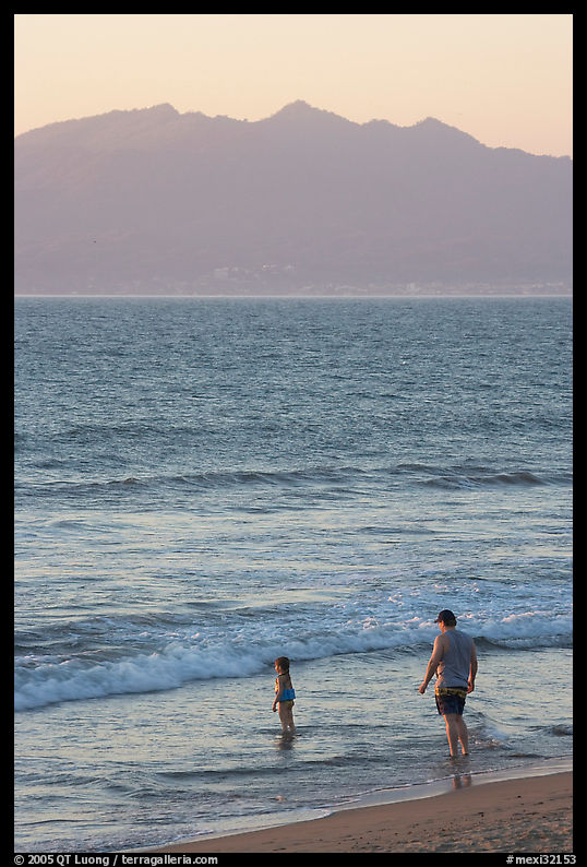 Man and child on the beach at sunset, Nuevo Vallarta, Nayarit. Jalisco, Mexico