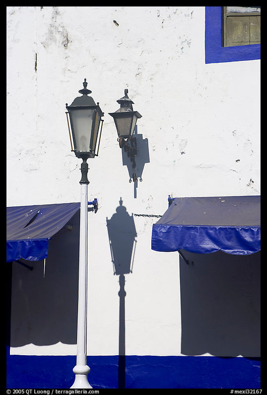 Wall with lamps, blue shades and blue painting, Puerto Vallarta, Jalisco. Jalisco, Mexico