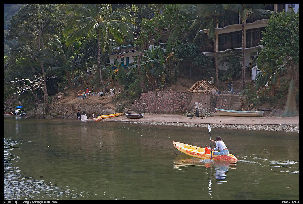 Woman using a canoe in a village on the South shore, Jalisco. Jalisco, Mexico