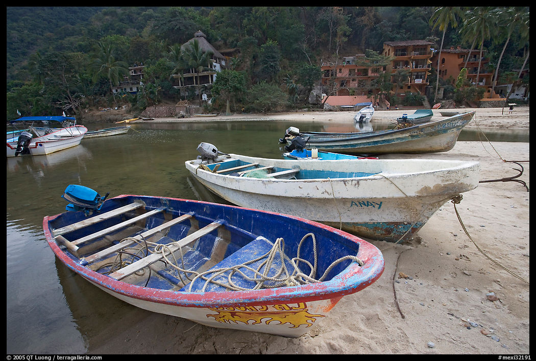 Small boats beached in a lagoon in a village on the South shore, Puerto Vallarta, Jalisco. Jalisco, Mexico