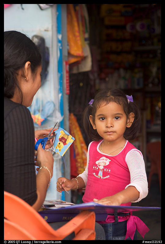 Girl playing with collages, Jalisco. Jalisco, Mexico