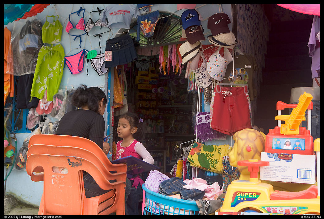 Woman and girl outside a store, Jalisco. Jalisco, Mexico