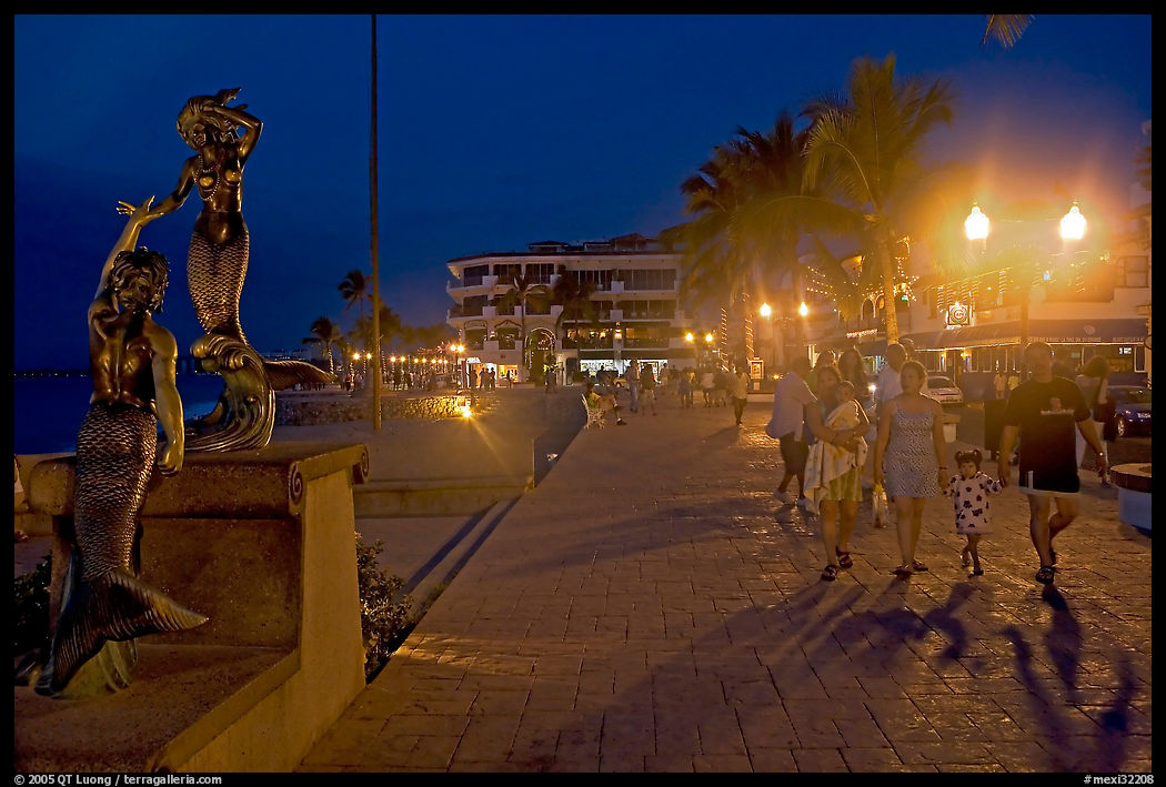People strolling on the Malecon at night, Puerto Vallarta, Jalisco. Jalisco, Mexico