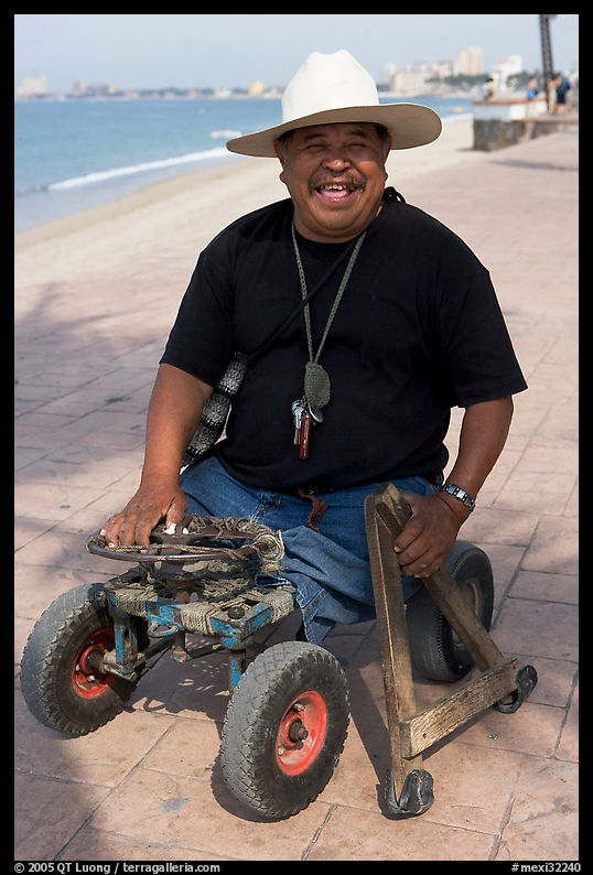 Man without legs  smiling on the Malecon, Puerto Vallarta, Jalisco. Jalisco, Mexico