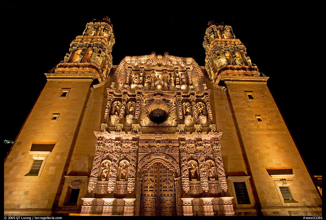 Illuminated facade of Cathdedral laced with Churrigueresque carvings at night. Zacatecas, Mexico
