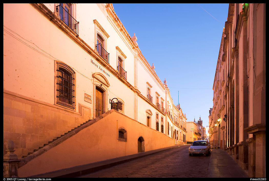 Car in street at dawn with Zacatecas Museum. Zacatecas, Mexico