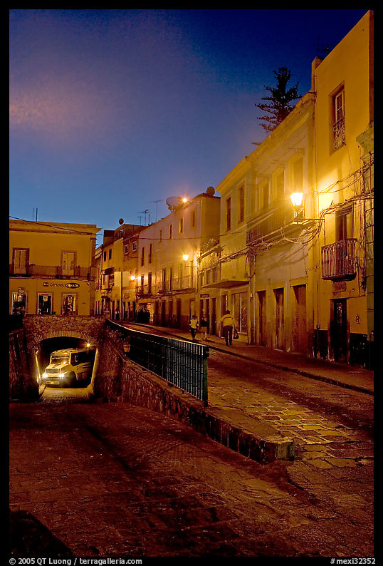 Juarez street and subterranean street with bus at night. Guanajuato, Mexico