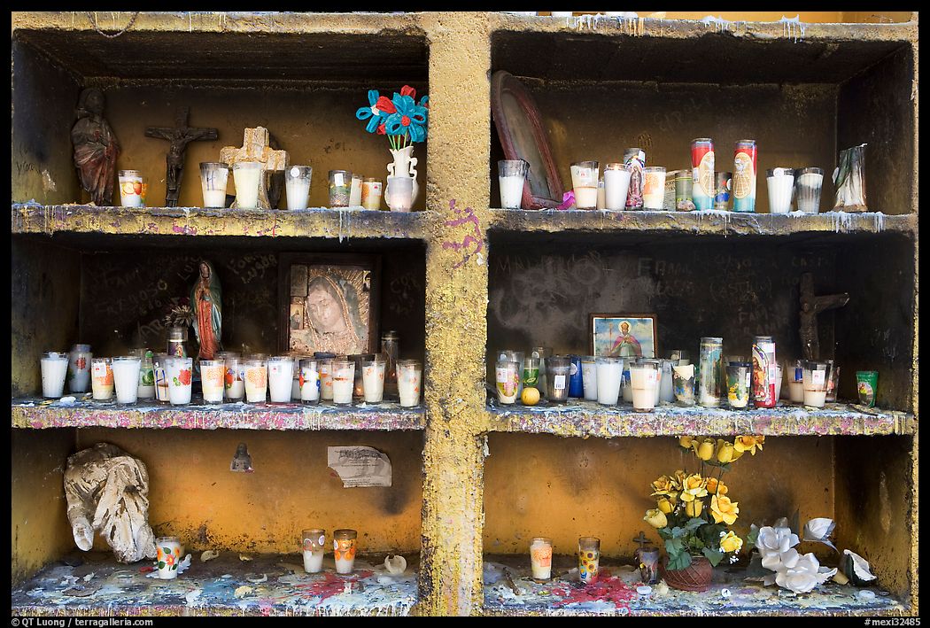 Candles in a roadside chapel. Mexico