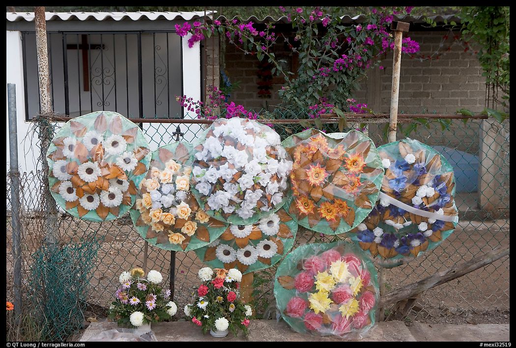 Floral wheels in a cemetery. Mexico