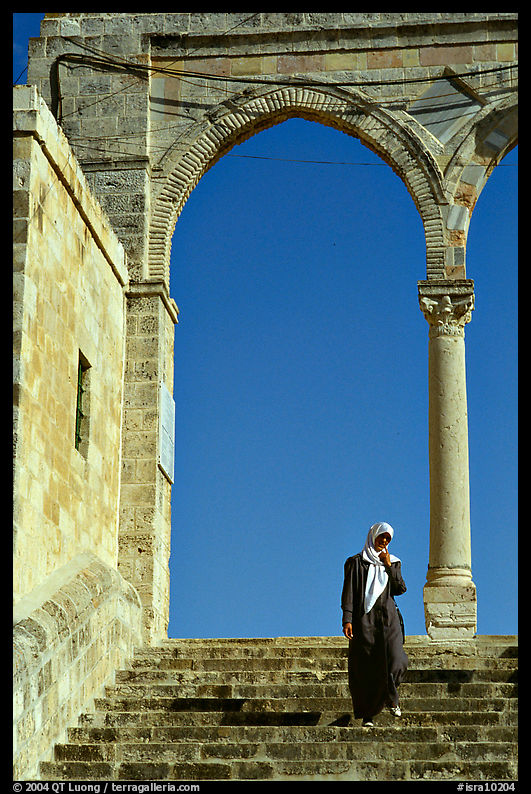 Muslim woman on stairs at the Dome of the Rock entrance. Jerusalem, Israel