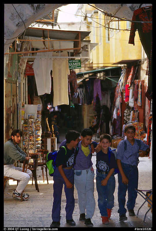 Children in a busy old town alley. Jerusalem, Israel