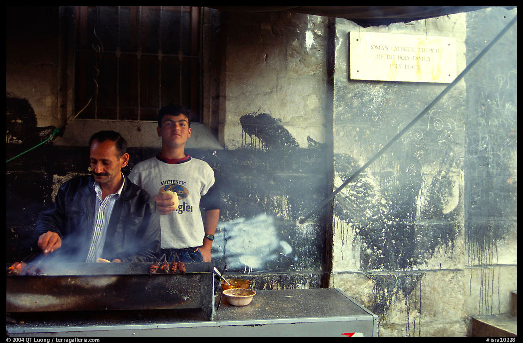 Food vendor broiling meat. Jerusalem, Israel