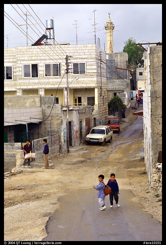 Two schoolchildren in a street of East Jerusalem. Jerusalem, Israel
