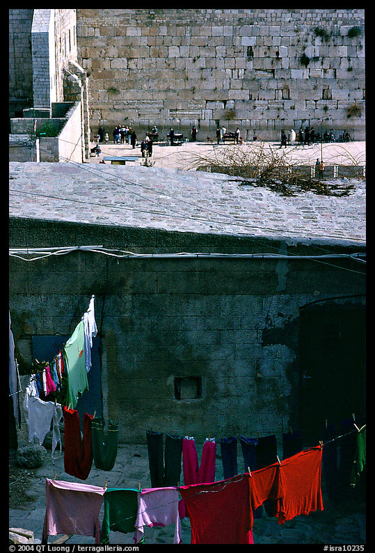 Laundry in a courtyard, with the Western Wall in the background. Jerusalem, Israel