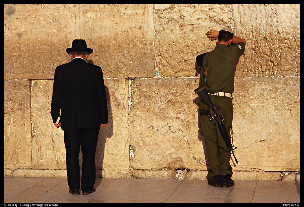 Orthodox Jew and soldier at the Western Wall. Jerusalem, Israel