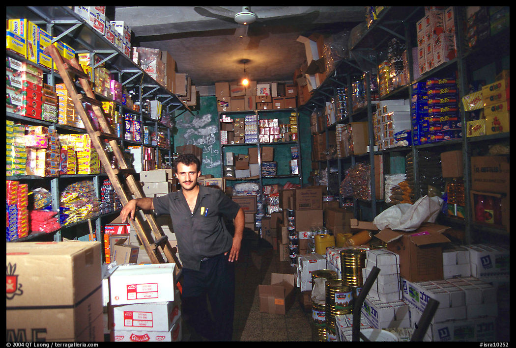 Man in a store, Hebron. West Bank, Occupied Territories (Israel)