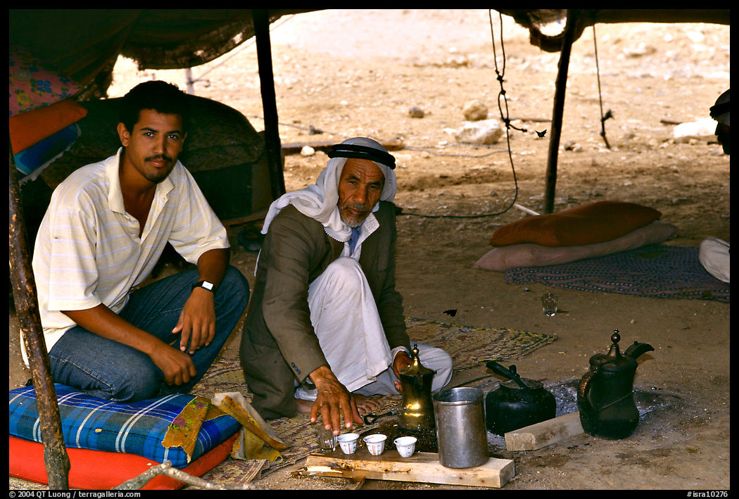 Bedouin men offering tea in a tent, Judean Desert. West Bank, Occupied Territories (Israel)