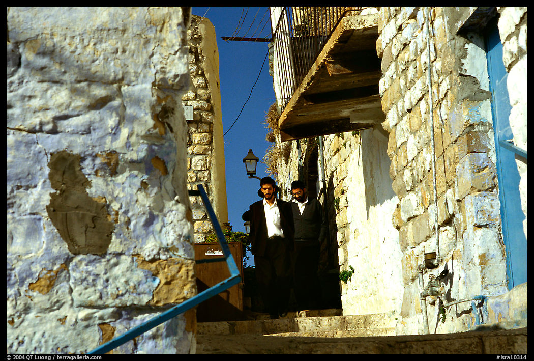 Orthodox jews in a narrow alley, Safed (Tsfat). Israel