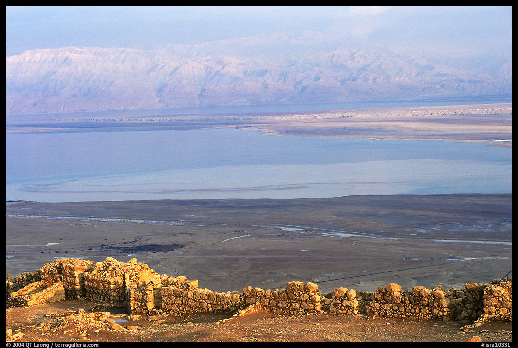 Ancient ruined walls of Masada and Dead Sea valley. Israel