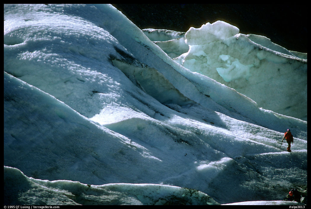 Alpinists training at the bottom of the Bossons glacier, only a quarter of an hour from the parking lot. Mont-Blanc range, French Alps