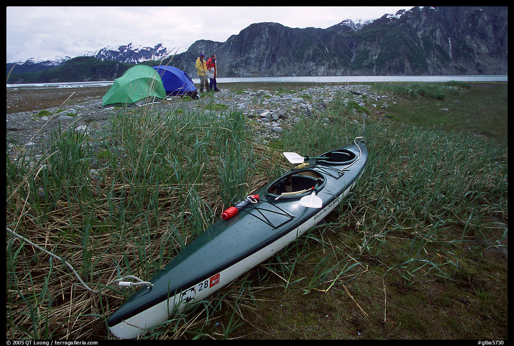 Camp on the flats near McBride Glacier with kayak parked nearby. Glacier Bay National Park, Alaska