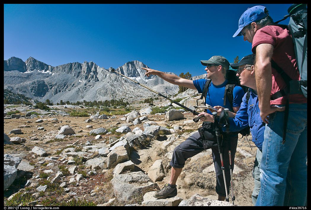 Hikers pointing, Dusy Basin. Kings Canyon National Park, California