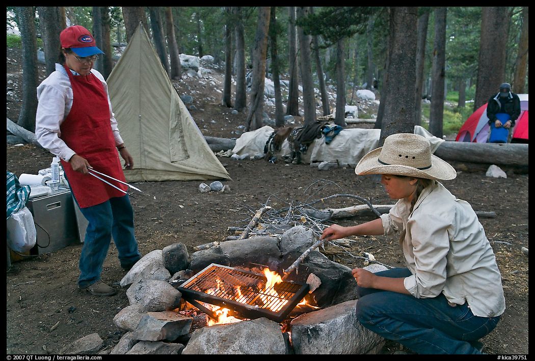 Women preparing food at camp, Le Conte Canyon. Kings Canyon National Park, California