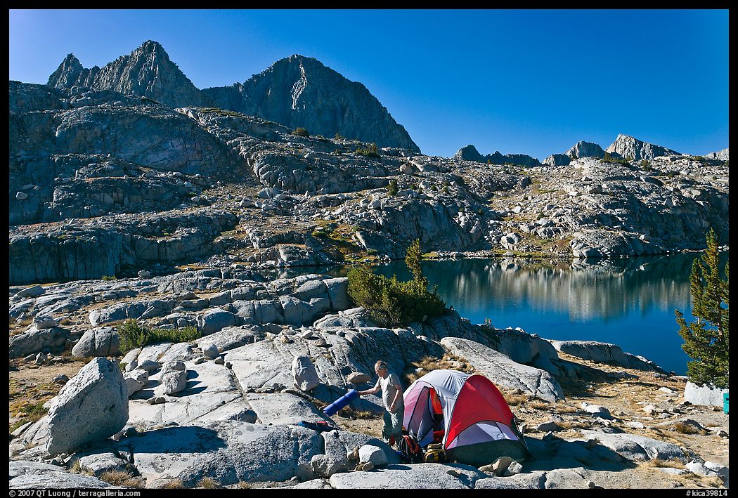 Breaking camp near lake, Dusy Basin. Kings Canyon National Park, California