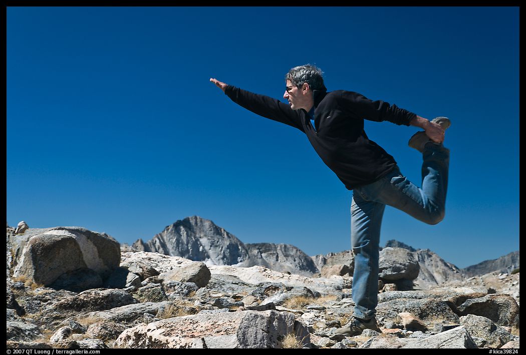 Hiker stretching, Bishop Pass. Kings Canyon National Park, California