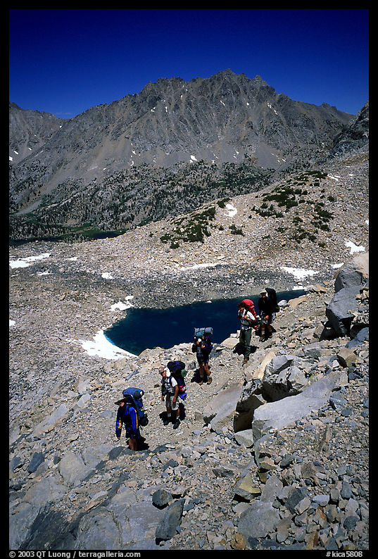 Backpackers near a tarn Lake. Kings Canyon National Park, California