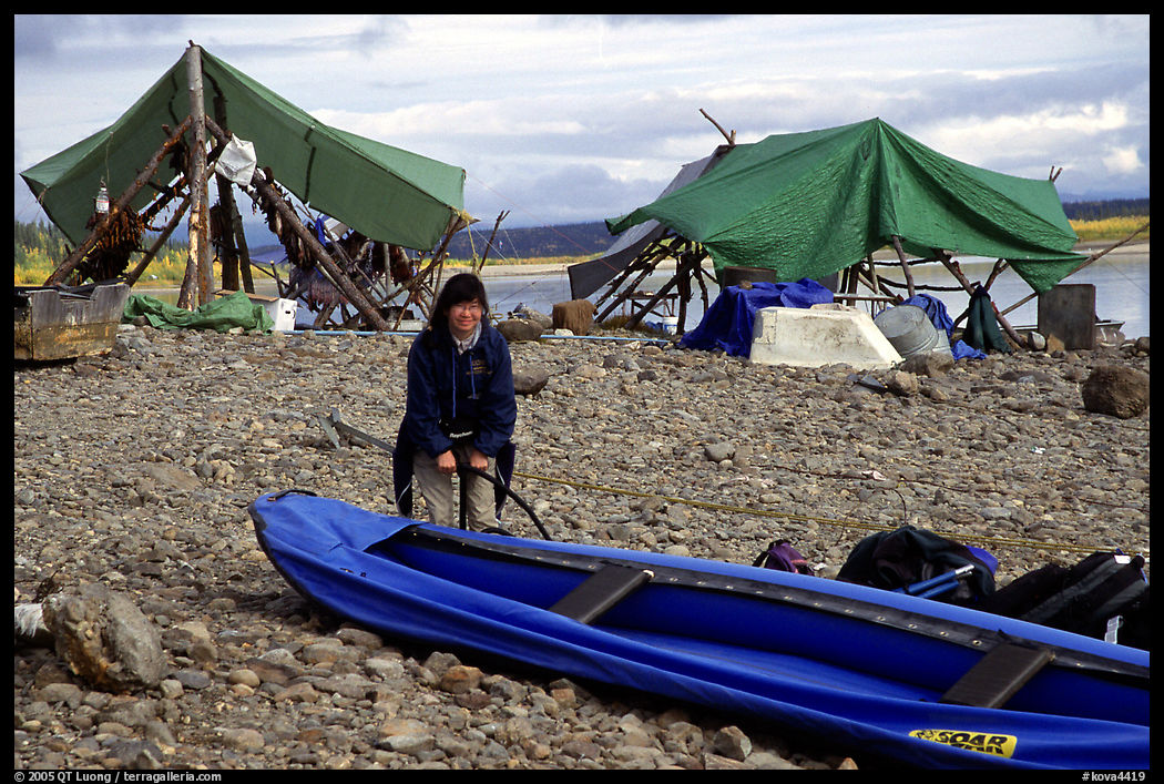 Inflating the canoe next to an Eskimo fish camp in Ambler. Kobuk Valley National Park, Alaska