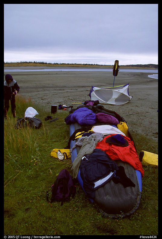 Gear laid out for drying on the bottom of the canoe on a small island of the Kobuk River. Kobuk Valley National Park, Alaska