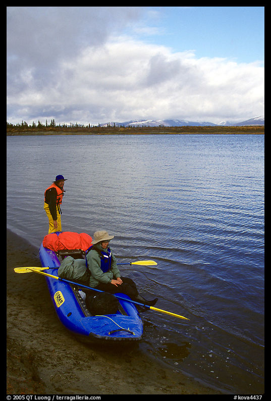 Canoeists ready to lauch with the boat loaded up. Kobuk Valley National Park, Alaska
