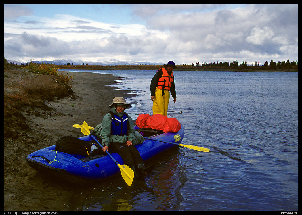 Canoeists ready to lauch with the boat loaded up. Kobuk Valley National Park, Alaska