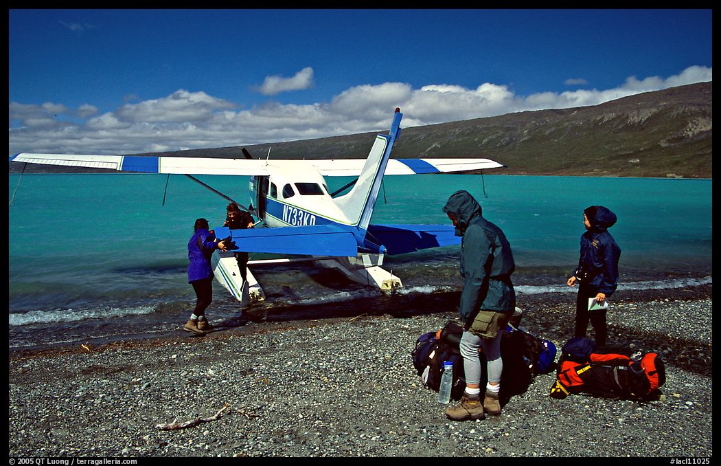 Backpackers dropped off by floatplane on Lake Turquoise. Lake Clark National Park, Alaska