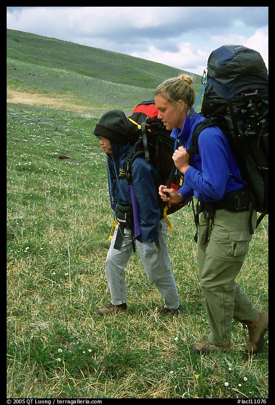 Two backpackers on the tundra. Lake Clark National Park, Alaska