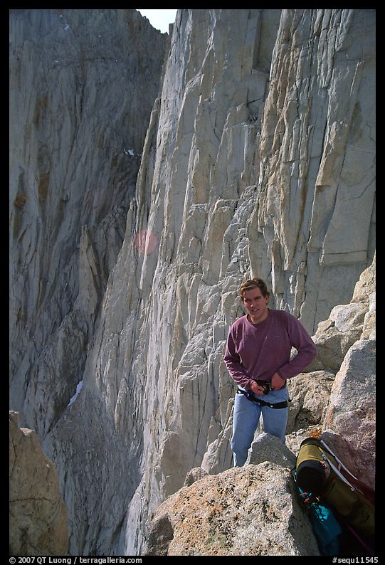 Man gearing up to climb  East face of Mt Whitney. Sequoia National Park, California